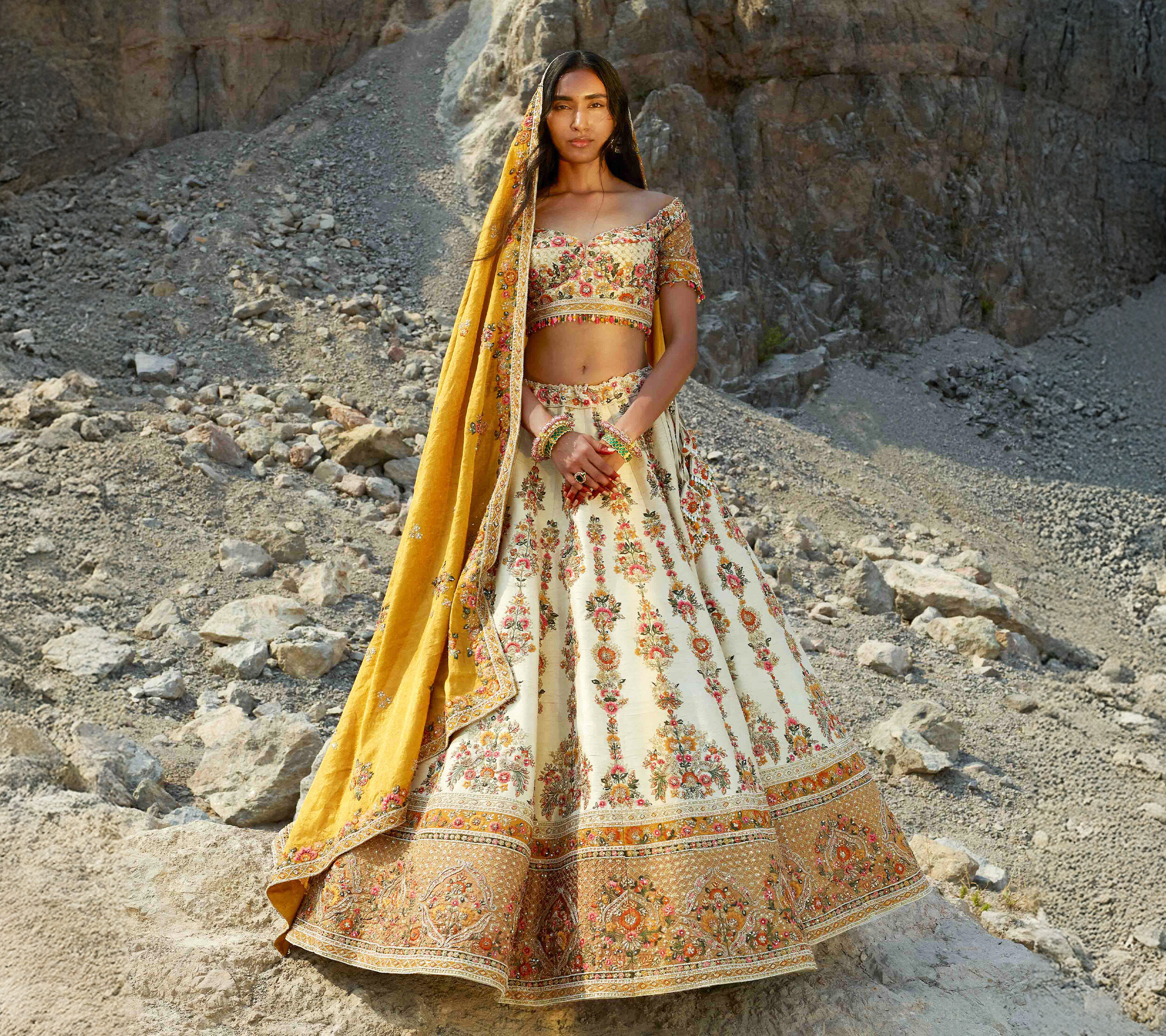 A beautiful woman in designer lehenga